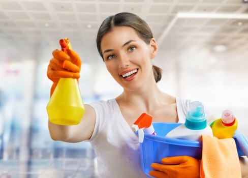 Professional carpet cleaners restoring a living room carpet in Alperton