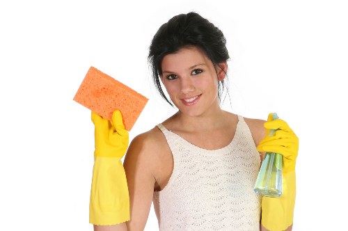 Technician using carpet cleaning equipment in Alperton